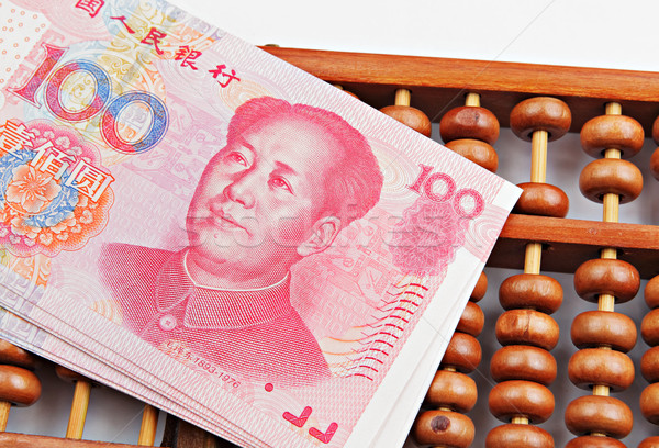 abacus and china money banknote Stock photo © leungchopan