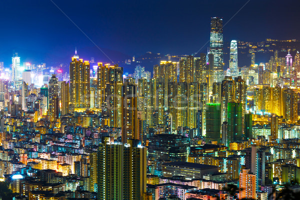 Hong Kong with crowded buildings at night Stock photo © leungchopan