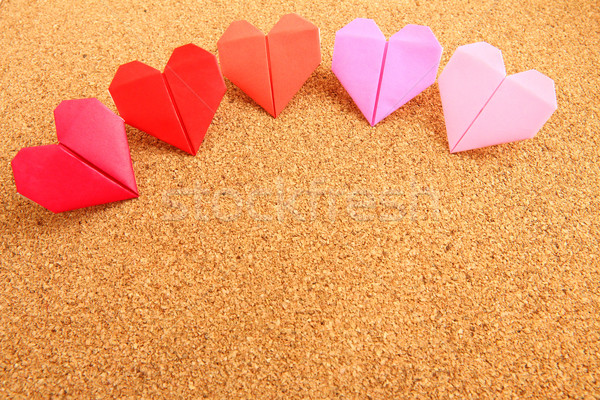 Origami colorful heart on corkboard Stock photo © leungchopan