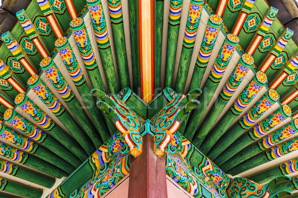 Traditional paintwork on wooden buildings, dancheong Stock photo © leungchopan