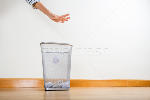 Stock photo: Throwing of paper ball by hand