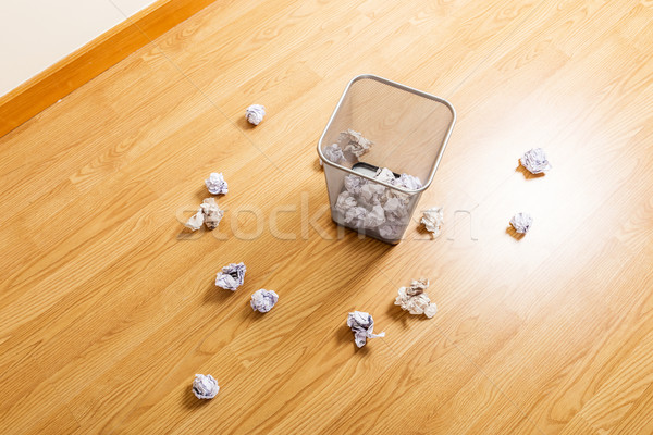 Trash bin and paper ball Stock photo © leungchopan