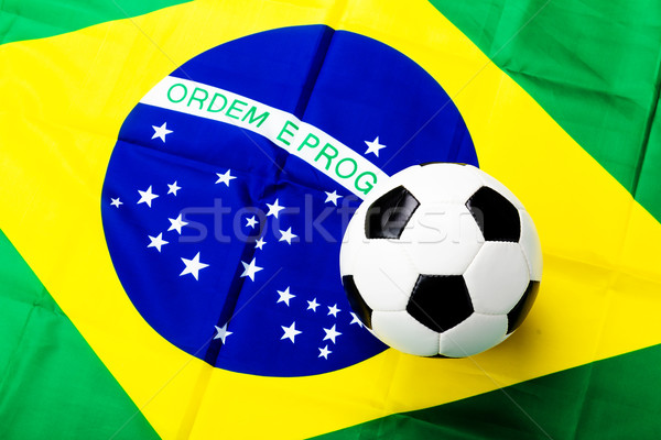 Brazilian flag with soccer ball Stock photo © leungchopan