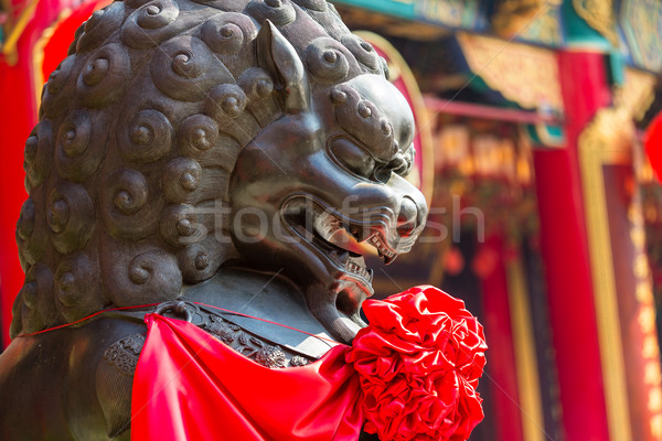 Lion statue in chinese temple Stock photo © leungchopan