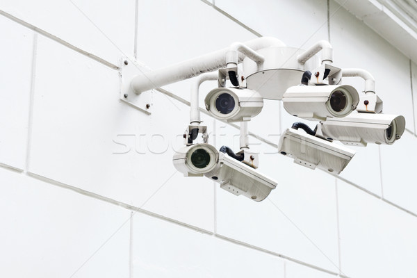 Wall mounted Surveillance camera  Stock photo © leungchopan