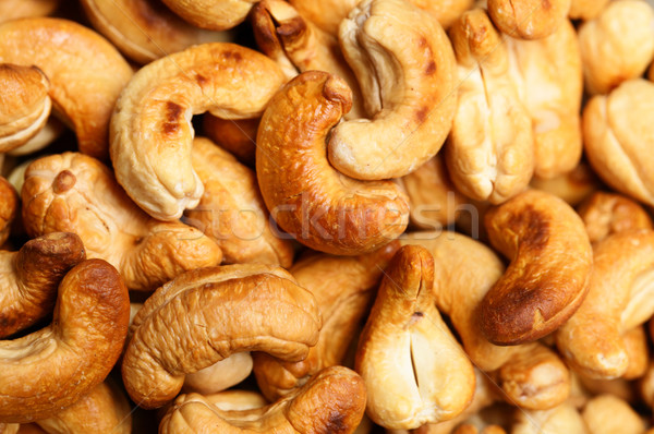 Roasted cashew nuts close up Stock photo © leungchopan