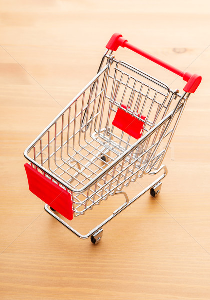 Trolley on wooden background Stock photo © leungchopan