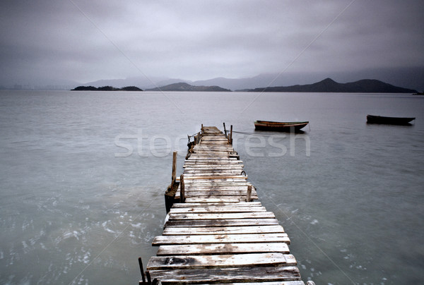 Pier Boot niedrig Wasser Landschaft Brücke Stock foto © leungchopan