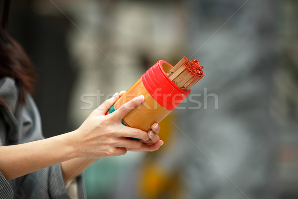 soothsaying, shake bamboo cylinder for fortune tell Stock photo © leungchopan