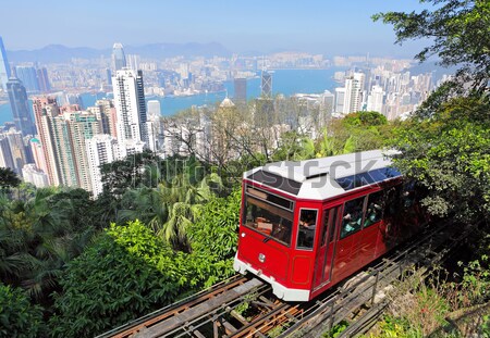 Turísticos tranvía Hong Kong árbol edificio Foto stock © leungchopan