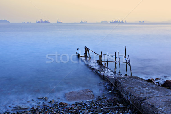 old pier at sunset Stock photo © leungchopan