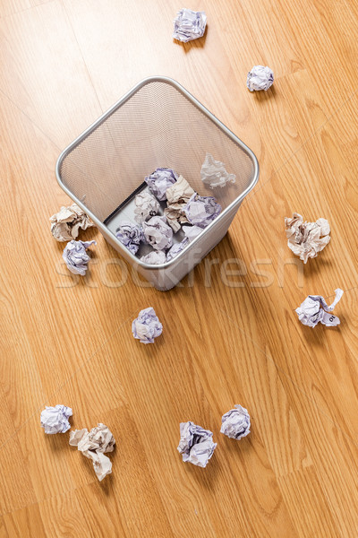 Trash bin and paper ball Stock photo © leungchopan