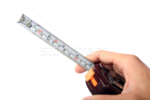 measuring tape hold by hand Stock photo © leungchopan