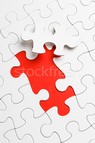 Incomplete puzzle with missing piece Stock photo © leungchopan
