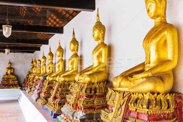 Gouden buddha tempel aanbidden gebed standbeeld Stockfoto © leungchopan