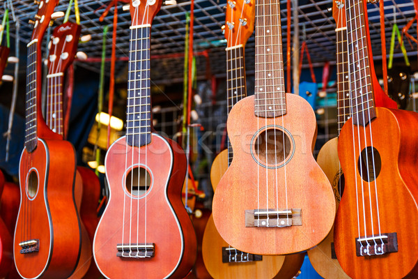 Ukulele guitar for sell in the market Stock photo © leungchopan