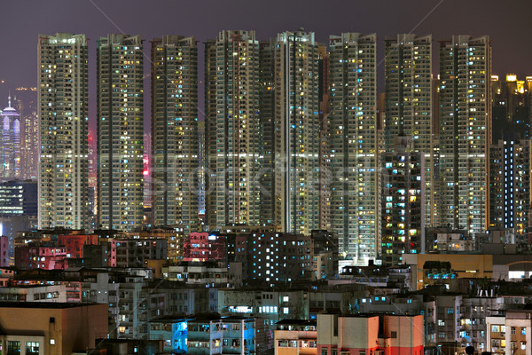 Hongkong überfüllt Gebäude Nacht Büro Gebäude Stock foto © leungchopan