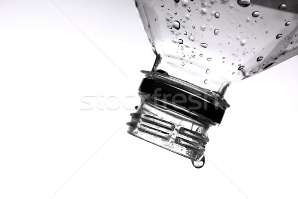 plastic bottle and water drop Stock photo © leungchopan