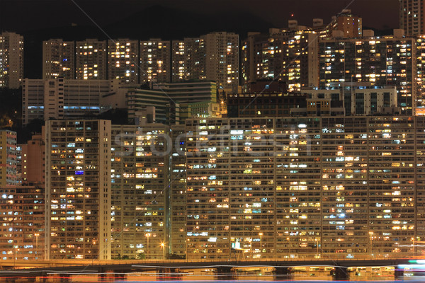 Hong Kong cityscape noite céu grama edifício Foto stock © leungchopan