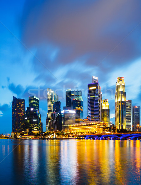 Stock fotó: Szingapúr · éjszaka · víz · város · sziluett · építészet