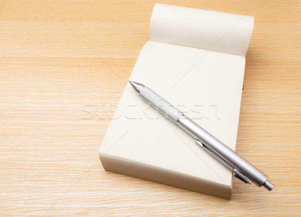 Memo pad and pen on the table Stock photo © leungchopan