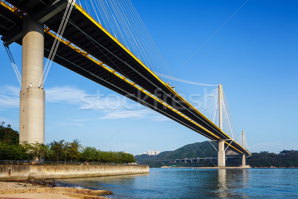 Asma köprü su deniz dağ köprü mavi Stok fotoğraf © leungchopan