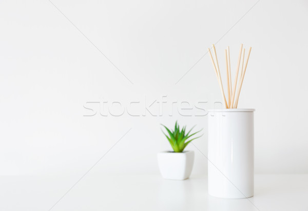 Home diffuser and potted plant Stock photo © leungchopan