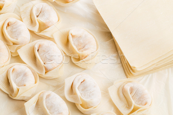 Homemade dumpling and raw material Stock photo © leungchopan