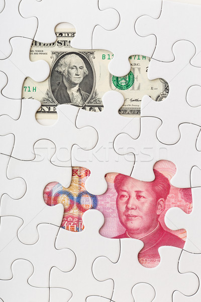 US and Chinese currency as part of puzzle  Stock photo © leungchopan