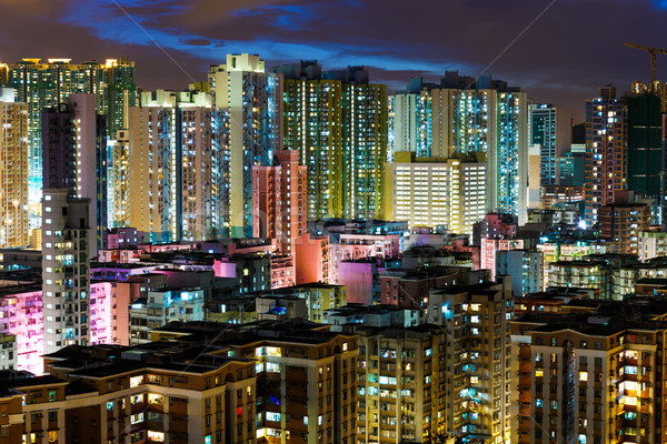 Mehrfamilienhaus Hongkong Nacht Gebäude home Skyline Stock foto © leungchopan