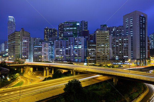 Hong kong downtown with traffic at night Stock photo © leungchopan