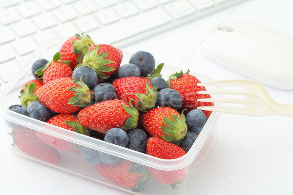 Healthy lunch box on office desk Stock photo © leungchopan