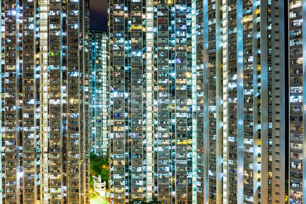 Packed building at night Stock photo © leungchopan