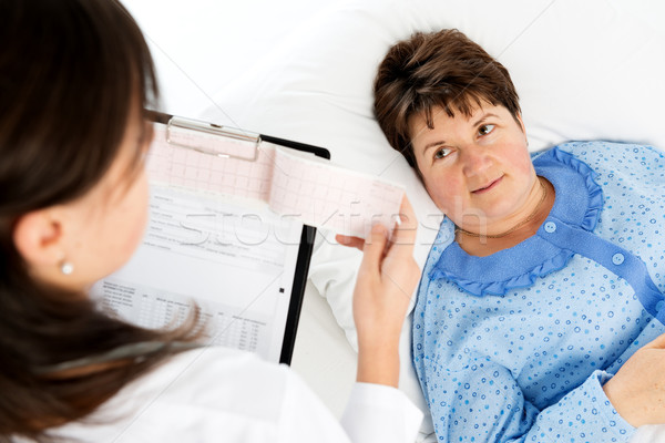 Doctor explaining medical results to senior woman Stock photo © leventegyori