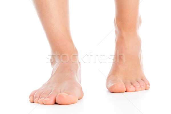 Woman legs isolated foot stepping Stock photo © leventegyori