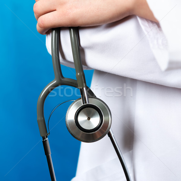 Orvosi orvos sztetoszkóp kék kéz otthon Stock fotó © leventegyori