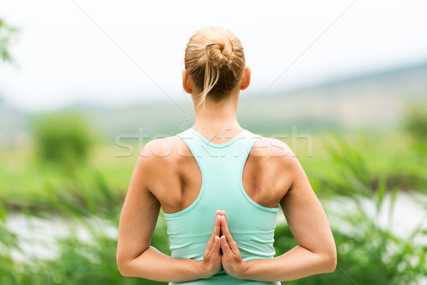 Reverse Prayer Yoga Pose Stock photo © leventegyori