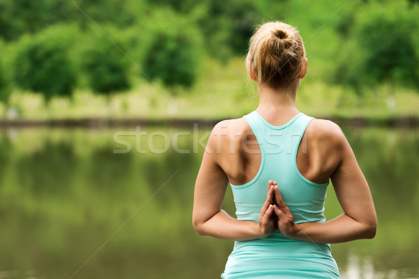 Female in Reverse Prayer yoga Pose Stock photo © leventegyori