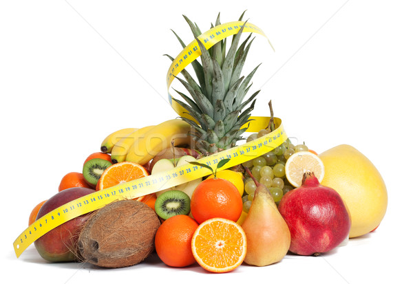 Tape measure and mixed fruits Stock photo © leventegyori