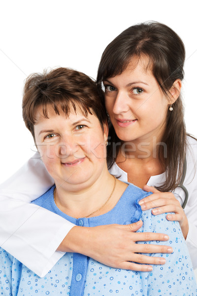 Nurse with patient smiling isolated on white Stock photo © leventegyori