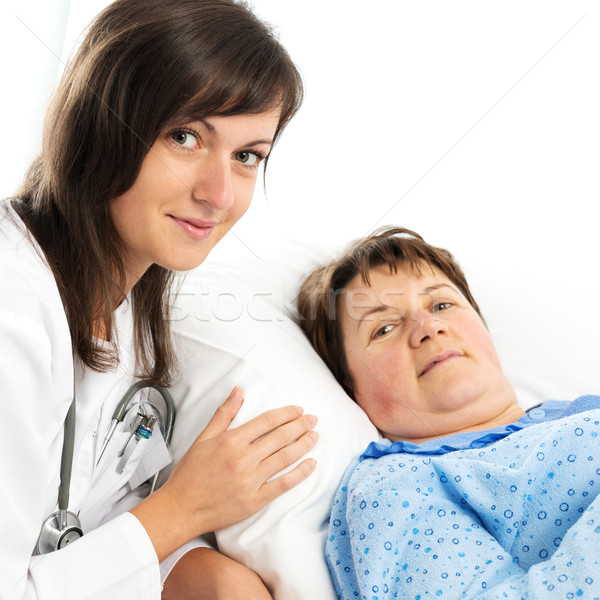 Portrait of nurse and senior patient Stock photo © leventegyori
