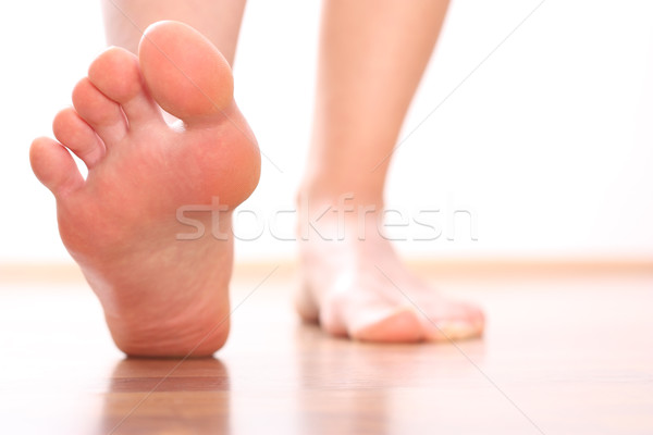 Foot stepping Stock photo © leventegyori