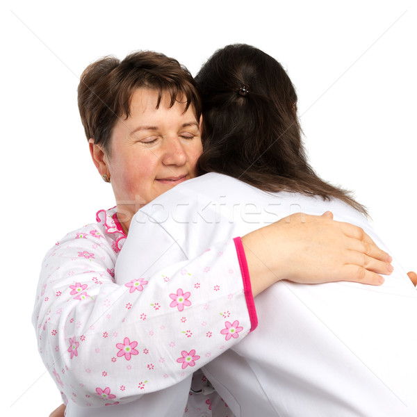 A senior woman and doctor hugging Stock photo © leventegyori