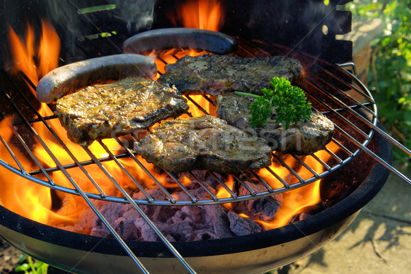 Barbecue főzés láng steak piknik barbeque Stock fotó © LianeM