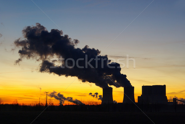Erőmű naplemente felhők technológia narancs gyár Stock fotó © LianeM