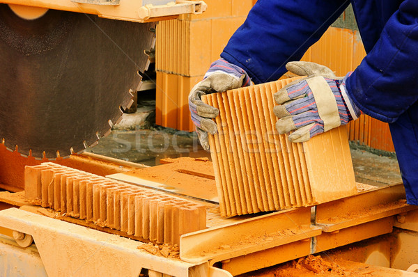 Stock fotó: Kő · fűrész · épület · építkezés · munka · tégla