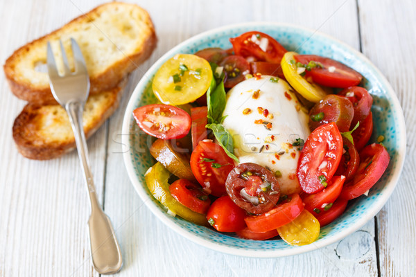 Taze domates salata olgun renkli arka plan Stok fotoğraf © lidante