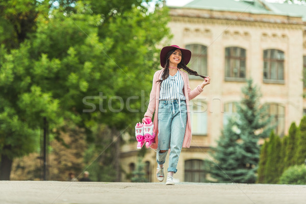 happy girl with roller skates Stock photo © LightFieldStudios