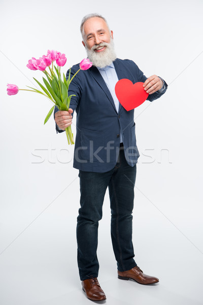 Senior man with tulips  Stock photo © LightFieldStudios