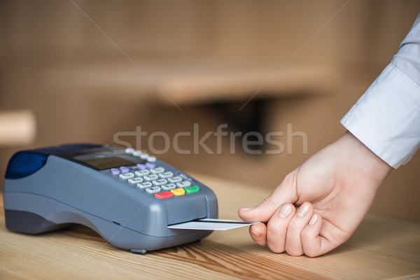 putting credit card into terminal Stock photo © LightFieldStudios